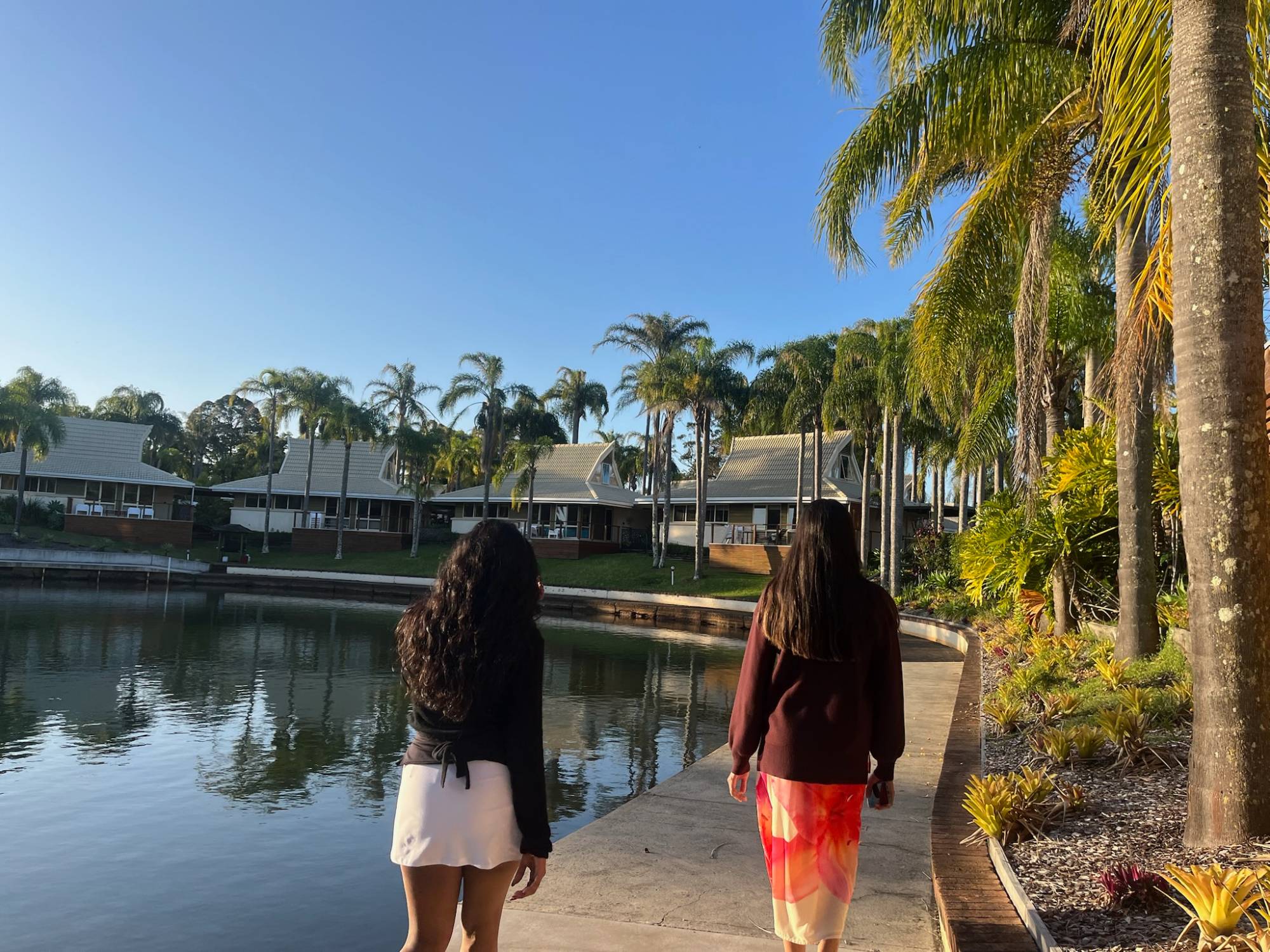 Guests walking along the lagoon at NILORA Resorts and Hotels Port Macquarie
